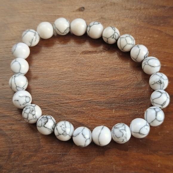 Bundle Of Two Stretch Bracelets, 1 Green/Black, 1 White/Black - Picture 2 of 5